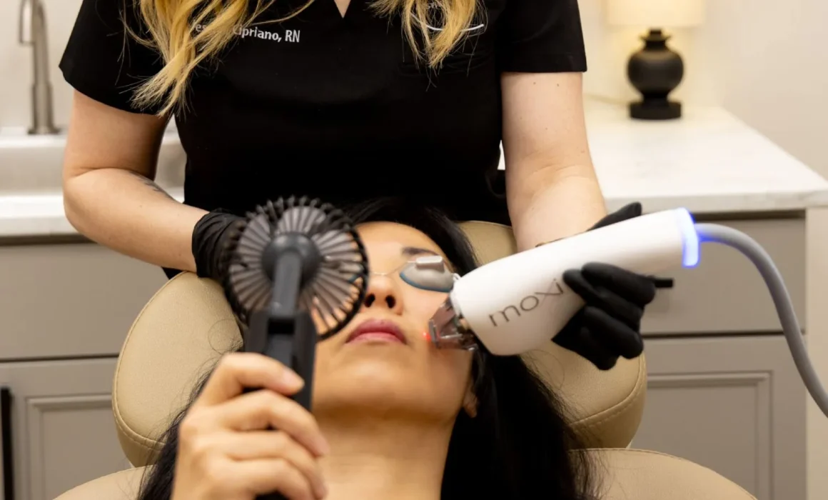 Moxi laser treatment being performed on patient at Fitz Aesthetics & Wellness in Edmond, OK
