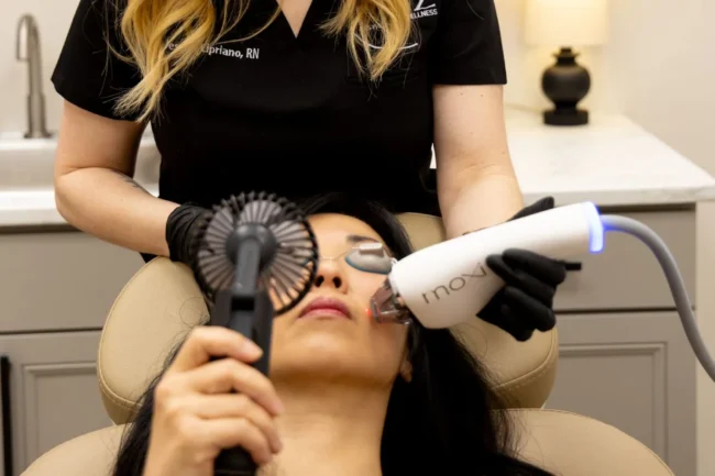 Moxi laser treatment being performed on patient at Fitz Aesthetics & Wellness in Edmond, OK