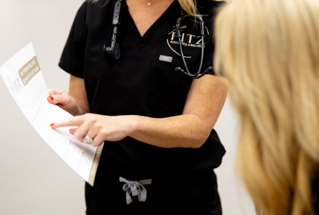Patient consulting with a medical weight loss specialist in Edmond Oklahoma about weight loss plateau.